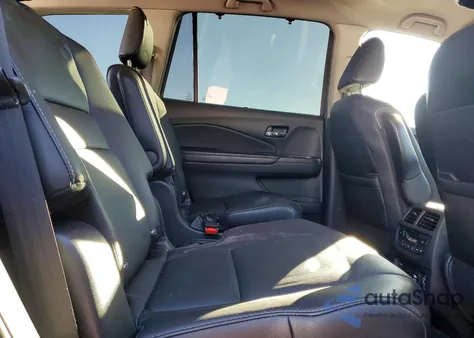 2021 Honda Pilot Touring from USA, damaged, VIN 5FNYF5H62MB021883